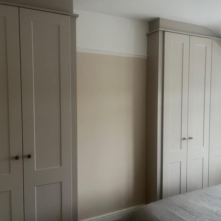 Bespoke fitted wardrobes Manchester installation showing storage solutions